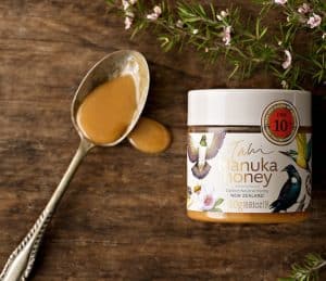 tahi manuka with spoon full of honey