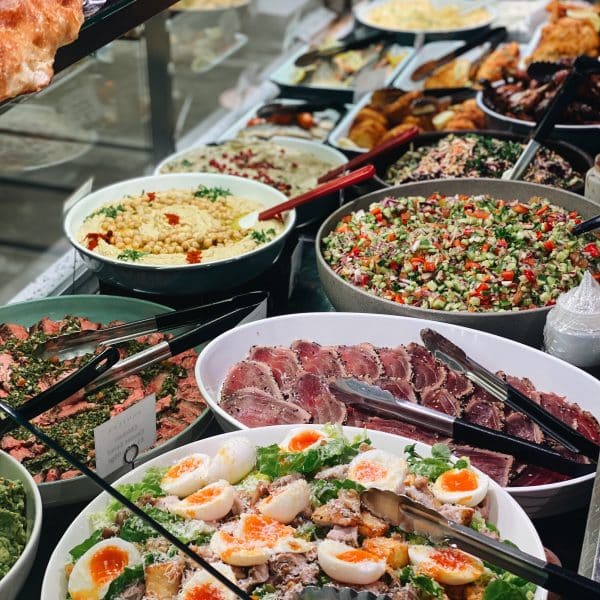 Deli counter full of fresh salads at Panzer's Deli